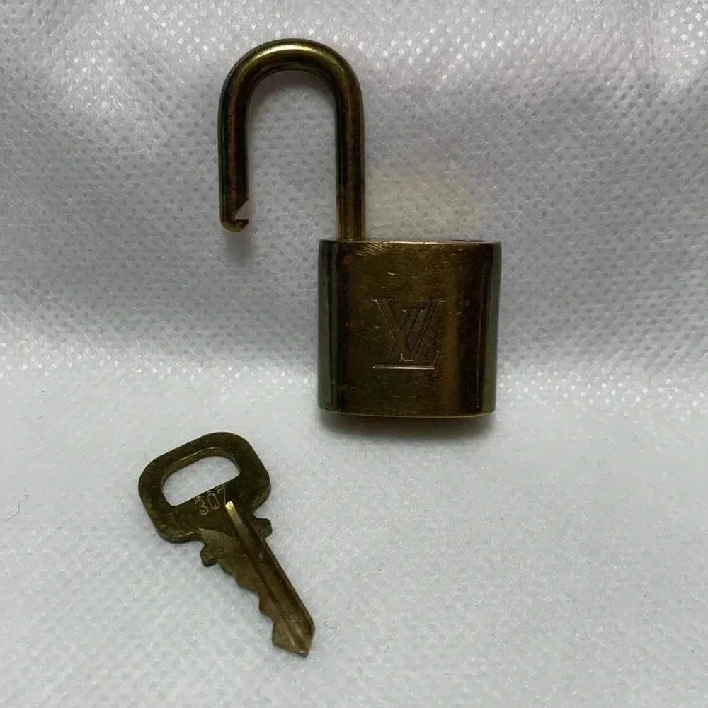 LOUIS VUITTON Lock & Key.  Key no: 307
